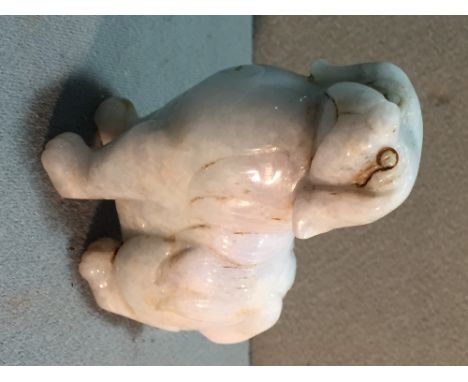 A Chinese carved jade Imperial dog
7 cm high. CONDITION REPORTS: Generally in good condition, expected wear.