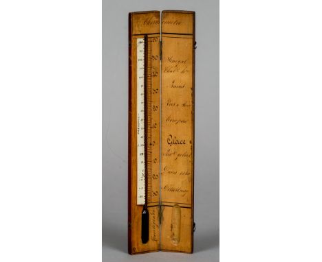 A French mahogany cased thermometer
The interior with centigrade scale and variously inscribed.  25 cm long overall. CONDITIO