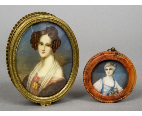 A 19th century gilt metal box
Of hinged oval form, the lid set with a miniature portrait on ivory of a young lady wearing pea