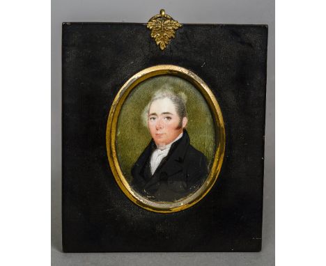 ENGLISH SCHOOL (19th century)
Portrait of a Gentleman in a Black Coat
Watercolour on ivory
5.5 x 7 cm, oval framed and glazed