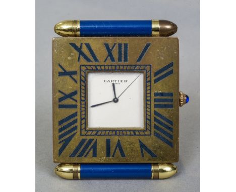 A Cartier Paris enamel decorated brass folding travel clock
5.5 cm wide.  CONDITION REPORTS: Some patination wear, general we