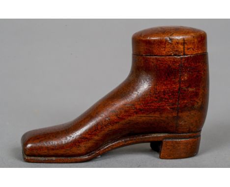 A carved wood shoe snuff box and cover
Of typical form.  5.5 cm high. CONDITION REPORTS: Generally good condition, expected w
