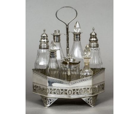 A George III seven bottle silver cruet stand and cruets, hallmarked London 1792, maker's mark of William Abdy
The pierced sta