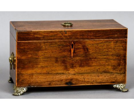 A 19th century rosewood caddy
Standing on gilt cast bracket feet, the interior previously fitted.  30 cm wide.  CONDITION REP