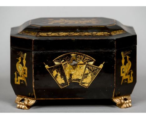A Chinese Export lacquered tea caddy
Typically decorated and enclosing a pair of white metal lidded canisters.  22 cm wide.  