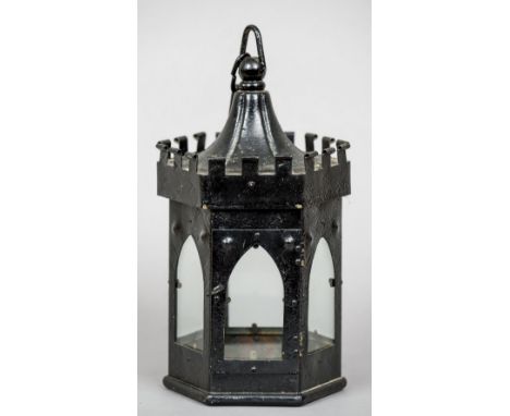 A 19th century painted iron hanging lantern
Of castellated form.  30 cm high. CONDITION REPORTS: Some rust pitting, general w