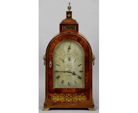 An early 19th century brass inlaid rosewood cased eight day repeating bracket clock
The silvered arched dial with strike sile