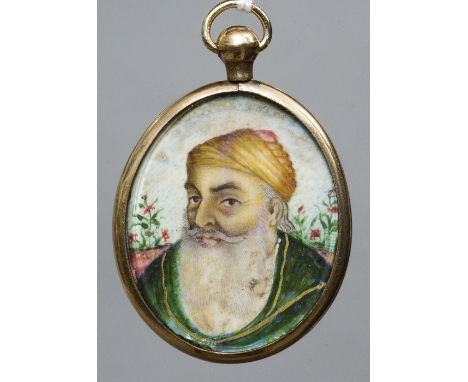 A 19th century Indian portrait miniature
Oval glazed and in unmarked gold frame with suspension loop.  5 x 3.5 cm overall. CO