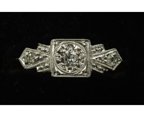 An Art Deco 9 ct gold platinum three stone diamond ring CONDITION REPORTS: Overall good, some general wear.