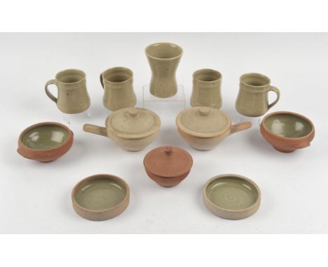 Leach pottery, four stoneware mugs, two small bowls, a pair of coaster dishes, a bowl with cover, a squat vase and a pair of 