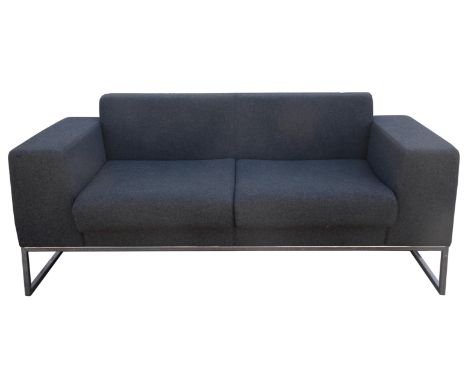 Boss, a two seat sofa, in grey material, with chrome legs, 68cm high x 161cm wide x 71cm deep, together with a single armchai