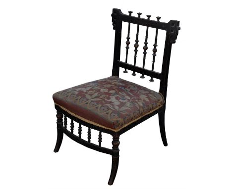 Aesthetic Movement, a black and painted japanned chair, with bobbin turned rails and gros-point seat, 69cm high