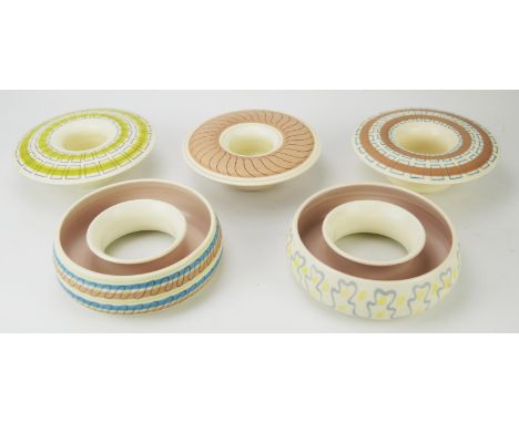 Poole pottery, three Freeform posy bowls and two flower rings, the bowls 18cm diameter, the rings 18cm diameter (5)Condition 
