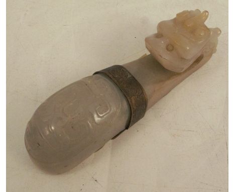 A 19th century Chinese jade belt hook, curved with a dragon, with metal mount, length 3.25ins - no obvious breaks or damage, 
