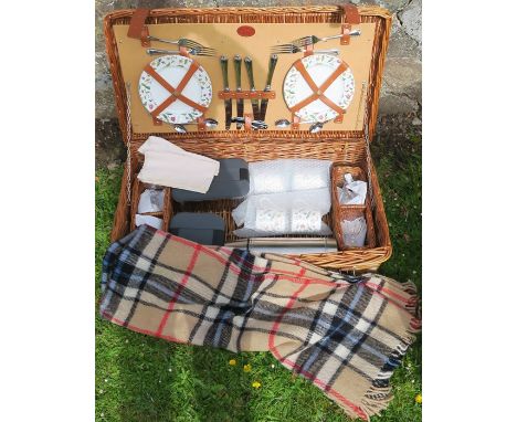 An Optima wicker picnic hamper, containing cutlery, china plates, glasses, containers, flask, tartan picnic blanket etc, 30.5