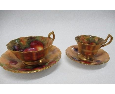 Two Royal Worcester cups and saucers, decorated with fruit by Mosley and Townsend&nbsp;- not damaged or restored
