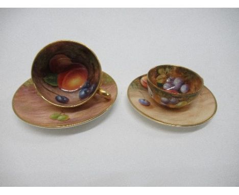 Two miniature Royal Worcester cups and saucers, decorated with hand painted fruit by Mabery and Roberts&nbsp;- not damaged or