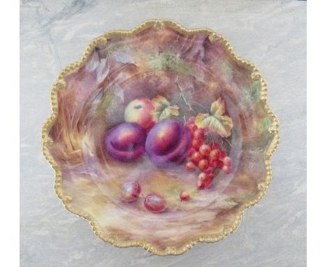 A Royal Worcester plate, with star shaped border, decorated with hand painted fruit by Horace Price, diameter 8.75ins - not d