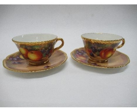 Two Royal Worcester tea cups and saucers, decorated with hand painted fruit by Freeman&nbsp;- not damaged or restored