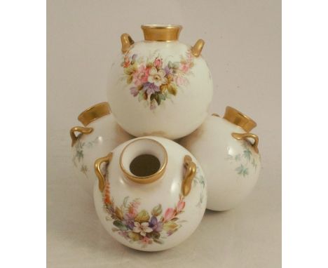 A Royal Worcester vase, formed as four circular pots in a triangular shape, decorated with flowers, height 5.5ins - Minor rub