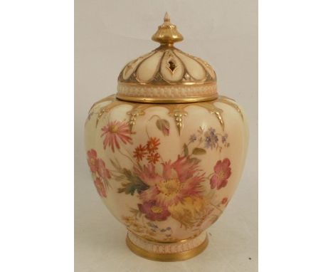 A Royal Worcester blush ivory covered pot pourri, decorated with floral sprays, having a pierced cover and inner cover, shape