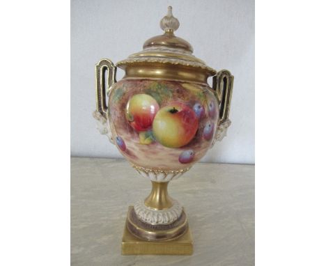 A Royal Worcester covered vase on a pedestal, decorated half round with hand painted fruit by Roberts, shape number 2363, hei