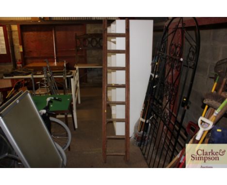 A wooden extending ladder