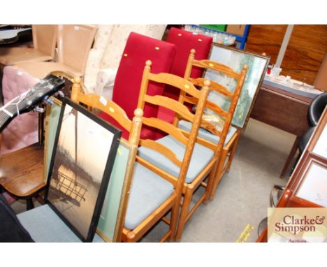A set of four pine ladder back chairs 