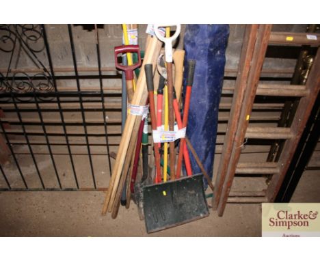 A quantity of long handled gardening tools etc