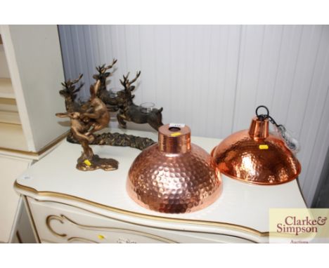 Two copper light fittings; a hare ornament and a candle holder in the form of a deer
