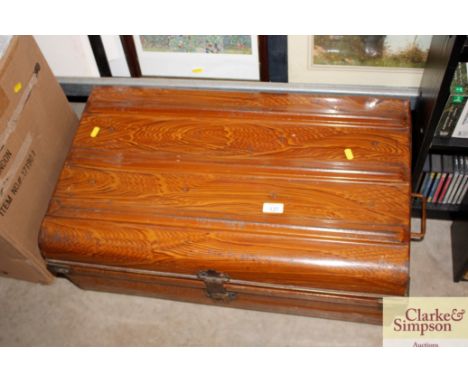 A Japanned tin trunk