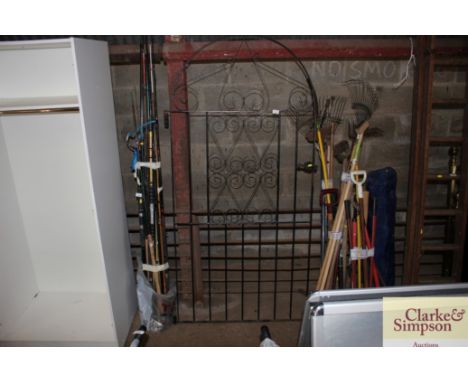 A wrought iron garden gate