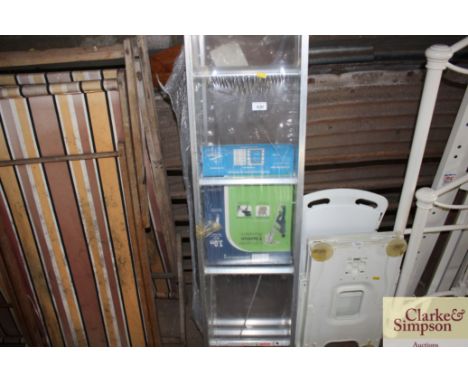 A three section aluminium loft ladder
