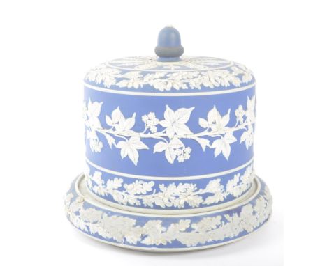 A large 20th Century ceramic lidded circular cheese / cake dish stand in the manner of Wedgwood Jasperware. Of blue ground wi