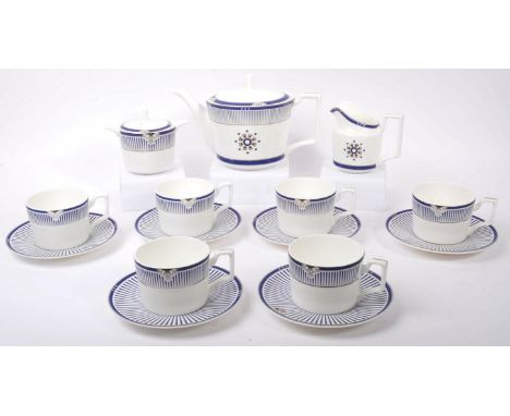 Tang Huayi - A 20th Century Art Deco style fine bone china tea service with Tang Huayi stamp to base. To include teapot, milk