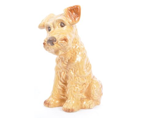 Sylvac - A large mid century ceramic Sylvac figure in the form of a brown terrier dog. The dog in sitting position with tongu