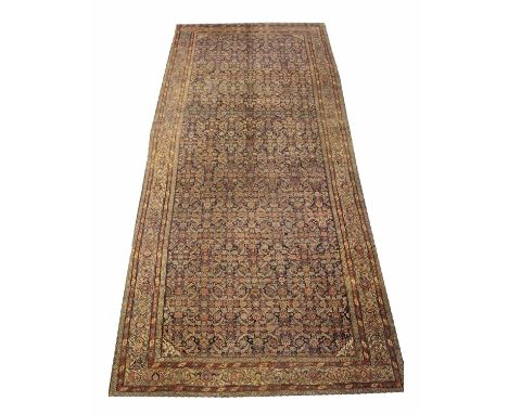 FINE ANTIQUE FEREGHAN KELLEH CARPET, 480cm x 225cm, all over herati design within matching borders.