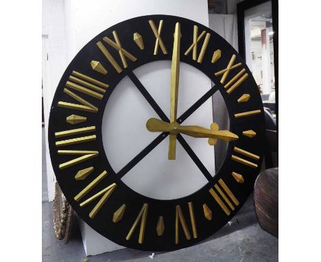 CLOCK FACE, architectural scale, black and gilt, with Roman numerals and gilt arrow hands, 200cm diam.