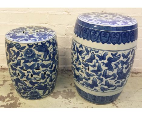 CHINESE GARDEN STOOLS, two, blue and white porcelain, one 36cm H x 28cm diam, the other 45.5cm H x 34cm diam. (2)