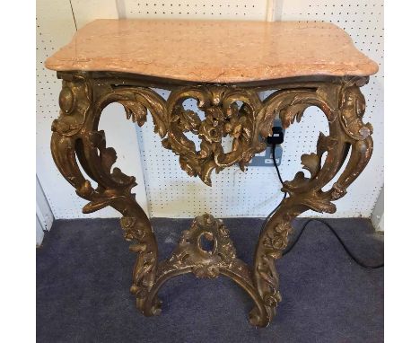 CONSOLE TABLE, 19th century French giltwood with C scroll frieze and later serpentine shaped pink marble top, 83cm H x 59cm W