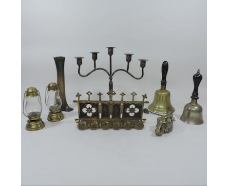 A collection of brass items to include two school bells, a pipe stand, door knocker and lanterns