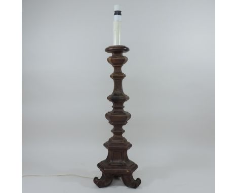 An oak altar stick, converted to a table lamp, 75cm tall overall