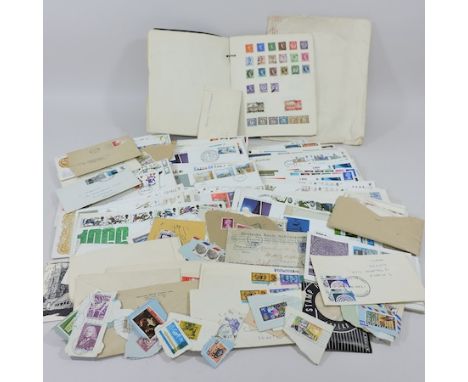 A collection of stamps and first day covers