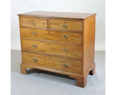 A George III mahogany chest of drawers, on bracket feet, 110cm