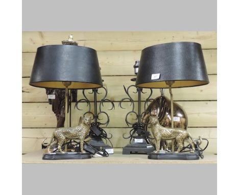 A pair of decorative metal table lamps, in the form of leopards, with shades, together with a pair of iron lamps, a large bro