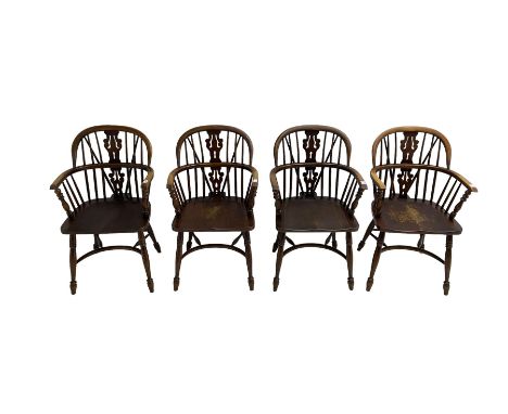 Late 20th century set four oak Windsor elbow chairs, double hoop and stick back with pierced and fretwork work splat, dished 