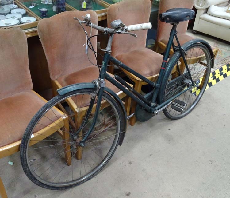 A Hercules Birmingham push bike with dark green finish