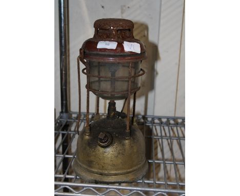 A vintage style tilly lamp 