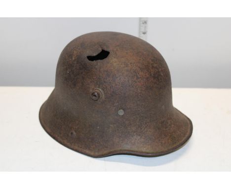 A WW1 German M18 military helmet with new liner 