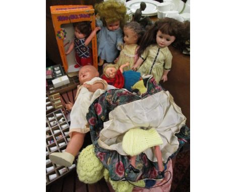 Retro and vintage dolls to include a Frank Ropper, circa 1950 composition doll and a quantity of knitted dolls clothing